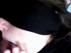Blindfolded MILF spits on and sucks a bigcock