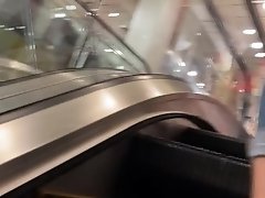 Incredible bubble butt on escalator!