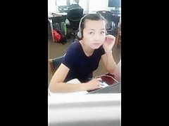 Sexy Chinese college girl dangles her feet while studying