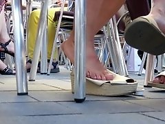 Greek Lady Dipping On Wedge Sandals 1