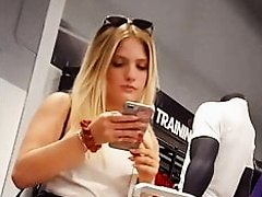 Candid voyeur Incredible blonde ass in shorts shopping mall