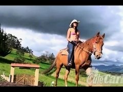 'Cute Carla rides a horse in bikini'