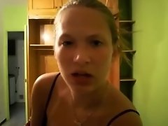 Young girls strips and plays with her tits