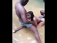 Africans having threesome in a rivier