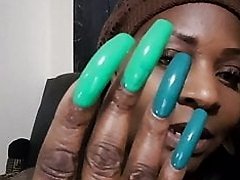 sexy black lady with awesome long nails fingernails