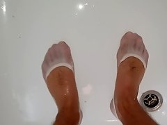 Pissing on white socks